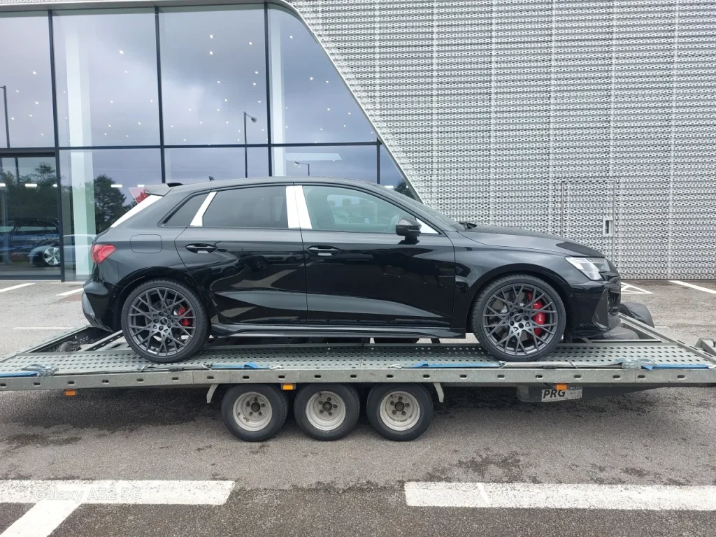 Black Audi RS3 performance car transported by WS Logistics across the North West