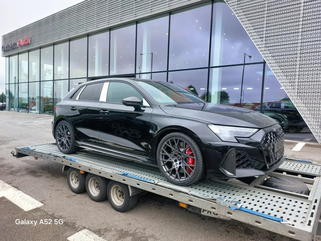 Black Audi RS3 collected from Oldham Audi by WS Logistics, dealer vehicle transport North West