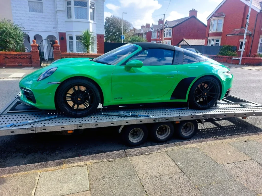 Green Porsche 911 Targa GTS transported by WS Logistics, prestige car delivery Lancashire