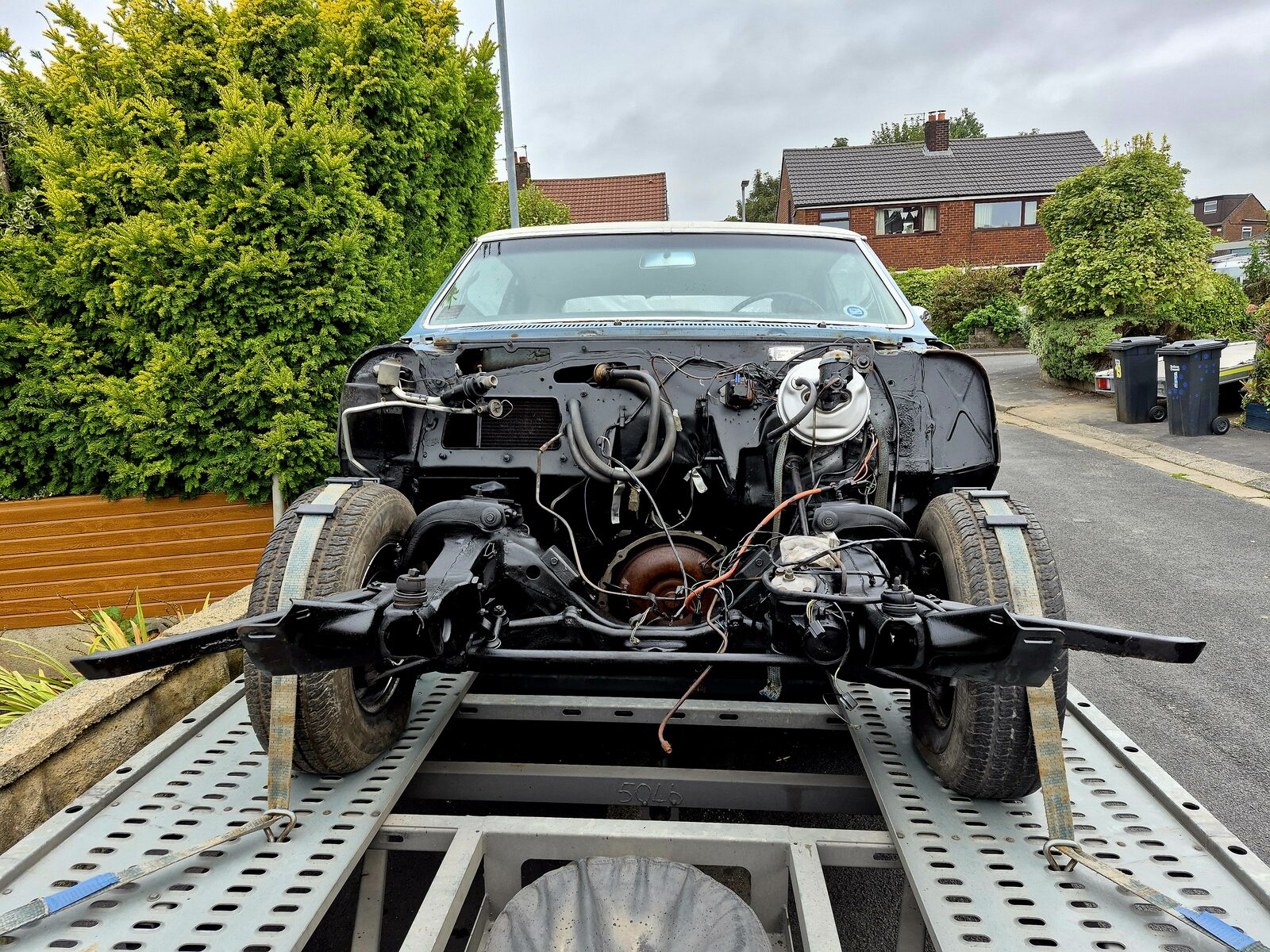 1966 Buick Skylark GS with the front end stripped, ready for project car transport from Bolton
