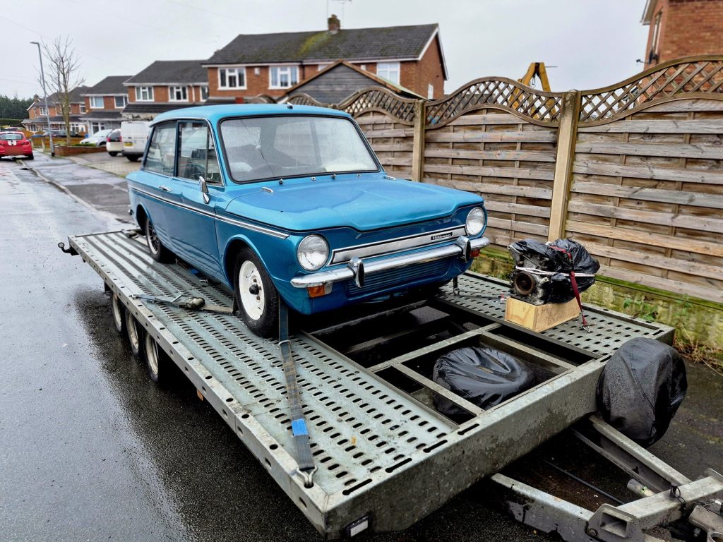 Hillman Imp collected as a non-runner, its engine travelling separately on the trailer beside it
