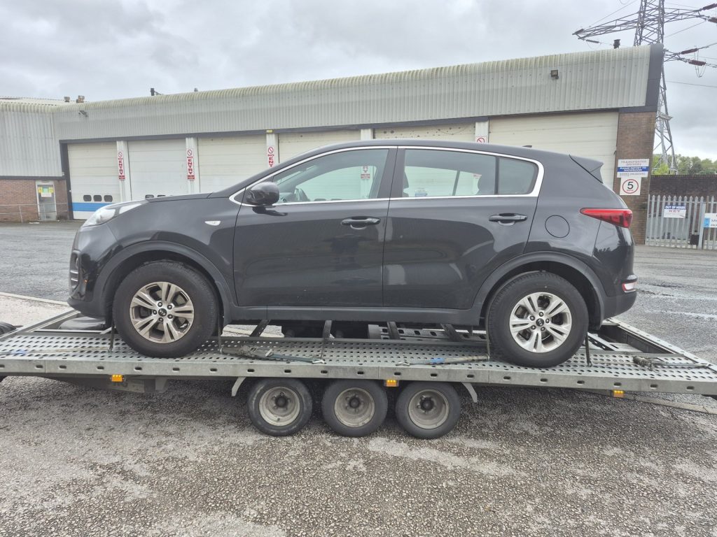 Everyday modern SUV loaded on the WS Logistics trailer for a local vehicle recovery in Lancashire