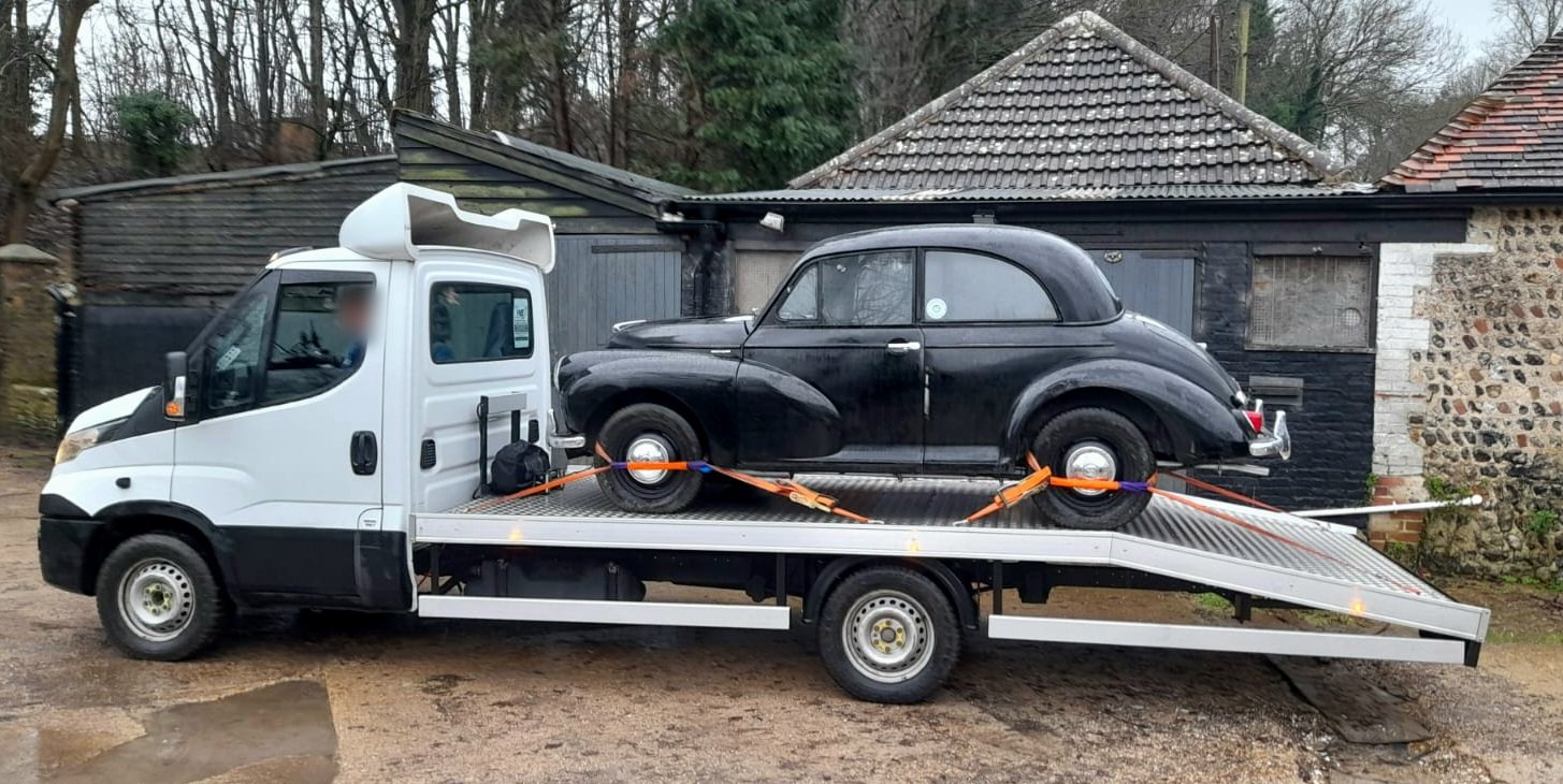 Black Morris Minor on the transporter, the very first WS Logistics classic car job